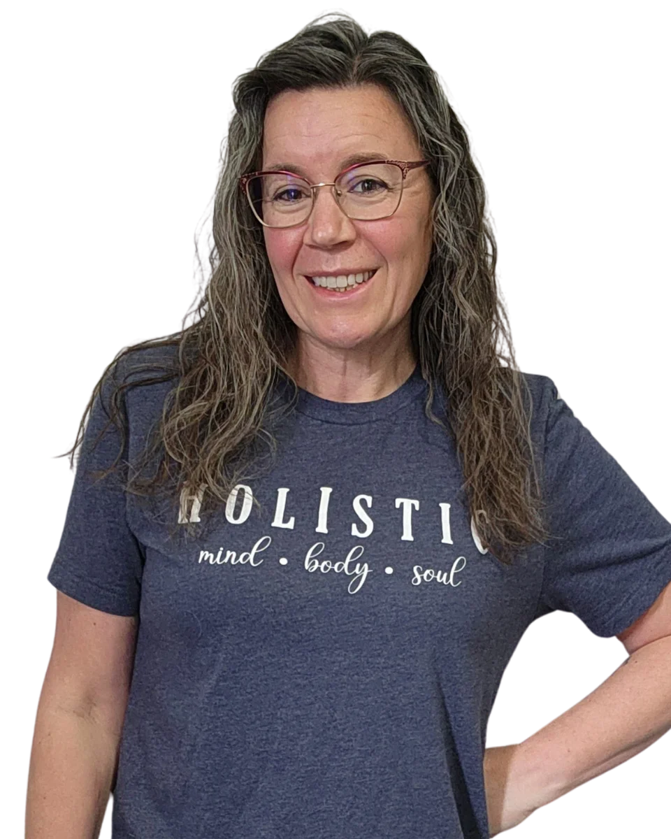 April Martinez smiling in a Holistic mind, body, soul shirt