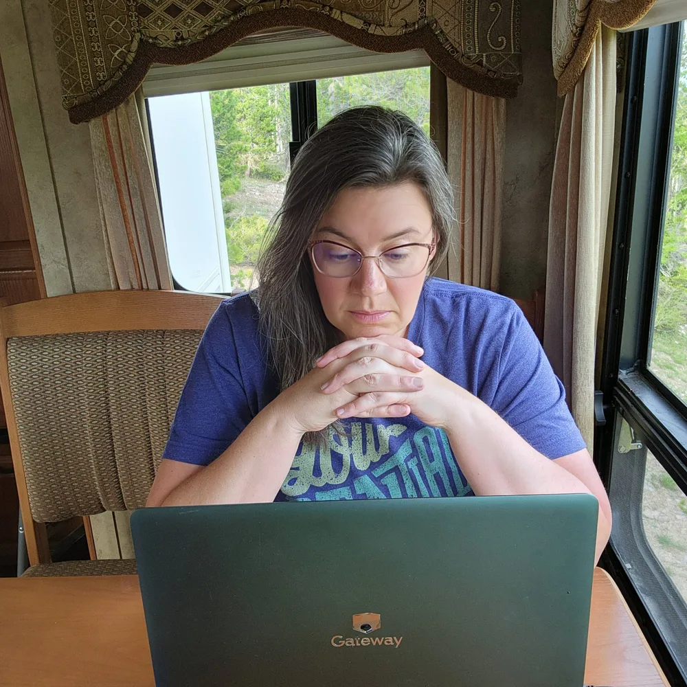 April reviewing bloodwork on her laptop